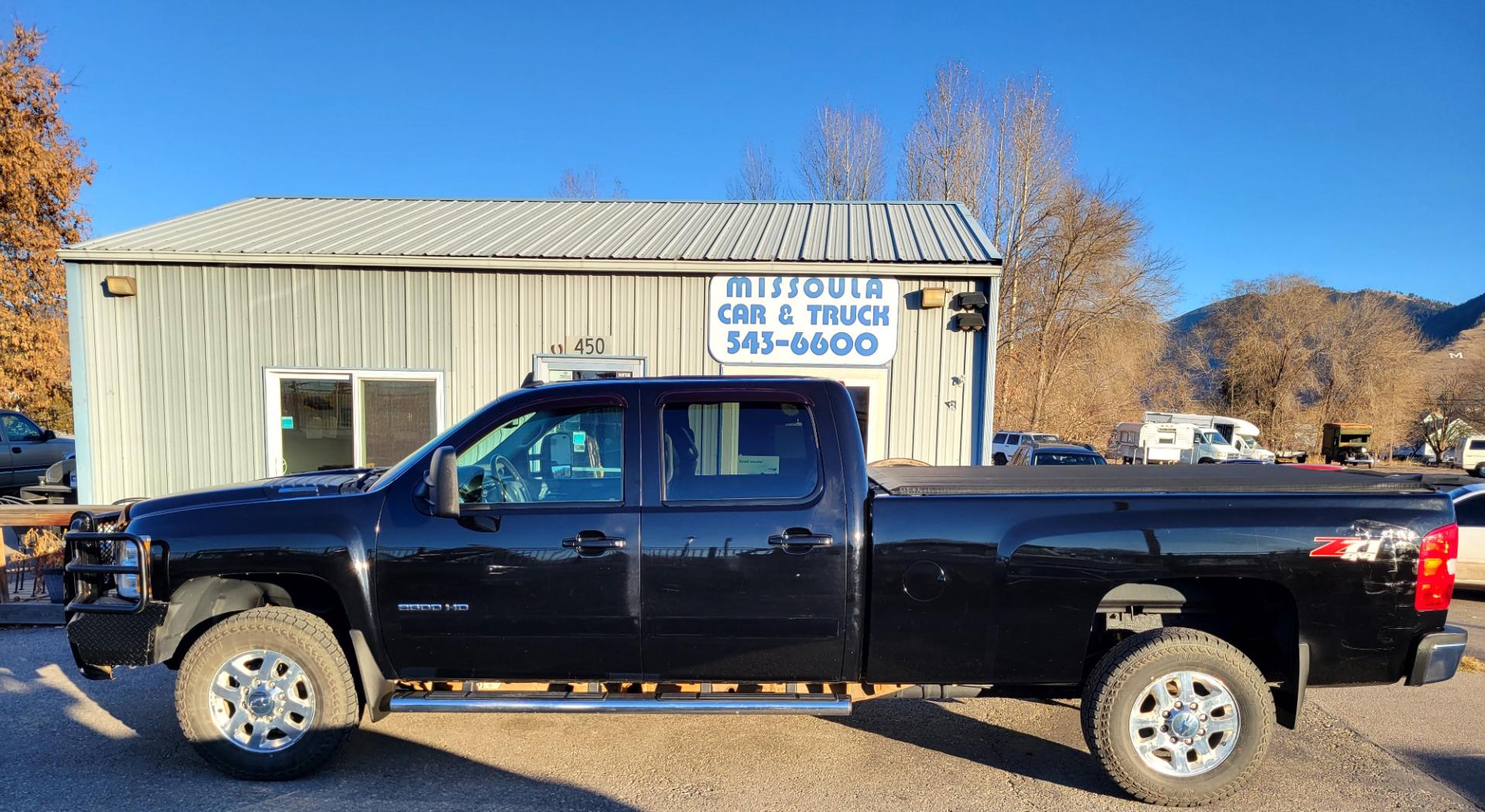 2014 Black /Black Chevrolet Silverado 2500HD LTZ (1GC1KYE87EF) with an 6.6L Duramax V8 engine, Allison Automatic transmission, located at 450 N Russell, Missoula, MT, 59801, (406) 543-6600, 46.874496, -114.017433 - Beast of a Truck. 1 Owner. Duramax Diesel. Allison Transmission. 4 Wheel Drive. Crewcab. Longbox. Power Sunroof. Running Boards. Air. Cruise. Tilt. Power Leather Seats. Heats Seats. Dual Climate Control. Tonneau Cover. Gooseneck Ball. Like NEW Tires. - Photo#0